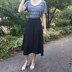 Beautiful high-waisted midi A-line black skirt
